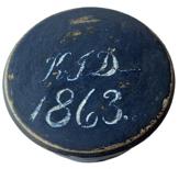 F220 Gorgeous small Treenware folk art wooden box with the initials K.T.D. and the date of 1863 on the top, a wonderful hand lathed round Treen box worked from one solid piece of wood. Hand painted in dark indigo blue with white lettering . All original finish4 diameter by 2 tall. A stunning piece of early folk art woodworking.