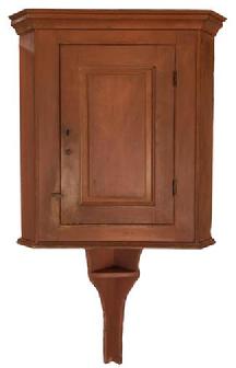 E579 Late 18th century Lancaster County Pennsylvania Hanging Corner Cupboard, with an extending tail with shelf, original salmon paint, circa 1780 - 1810 