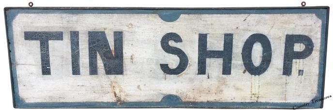 D265 Pennsylvania painted pine Tin Shop trade sign 19th c., 12 1/2" x 37 1/2".