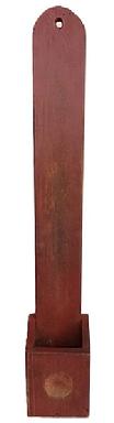 M76 19th century New England Scouring Box in original red paint. Tall tombstone shaped back with center hole for hanging. Canted sides on box, with a circular concave area where the lye soap would rest when drying. The wood is pine with square head nail construction. The back has BLENHEIM PIPPIN stenciled in faint black paint indicating this item may have been made with heavy duty apple crates. Measurements: 4 ½ wide (back) x ¾ thick x 35 ¾ tall. The box portion is 6 1/8 wide x 4" deep x 7 1/8 tall (front) x 8 5/8 tall (back).