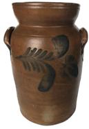 E416 19th century 2 gallon blue decorated stoneware butter churn, Baltimore, MD circa 1850-70. two handles and bold double flowers on front and back. The crock stands 11" tall