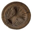K63 19th century tall handled chip-carved butter print stamp of Pennsylvania origin depicting a tied Sheaf of Wheat. Carved from a single piece of wood. Natural patina surface. Age cracks to surface. Measurements: 4 1/4" diameter x 4 3/4" tall