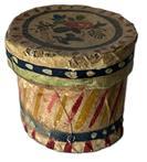 K280 Extremely RARE 19th century miniature Wallpaper Box in outstanding condition. Paperboard, handstitched construction covered in hand painted wallpaper bearing a floral motif on the lid with red, white yellow, pale green and blue paint decoration on the sides. From a Pennsylvania collection. Sturdy with a tight-fitting lid. This is the smallest wallpaper box we have ever seen! Measurements: 2 diameter x 1 ¾ tall.