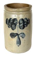 L221 19th century cobalt blue decorated Stoneware Jar attributed to Peter Hermann of Baltimore, Maryland. Beautiful hand painted heavy cobalt blue flowers adorn both sides of the tall, cylindrical form crock with flat bottom, tooled shoulder, and flat-topped rim. Peter Hermanns pottery was on Edger Street in Baltimore from 1850-1872. Measurements: 6 6 ¼ top diameter x 10 tall.