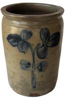 E301 Peter Herman signed Crock, This crock was made in Baltimore circa 1850 to 1870. It is decorated in cobalt with a oversize single stemmed,flower. The crock has an attractive, smooth-sided shape Measurements are 11 1/2" tall x 8 1/2 " diameter