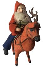 E513 20th Century Santa Riding a Reindeer Figure, candy container, felt cover, red jacket, blue trousers, 10"h.