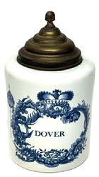 **SOLD** M281 20th century ceramic Delft lidded Tobacco Jar with traditional blue and white painted designs including a crown and foliage with Dover painted on the front and Delft and Made in Holland prominently painted on bottom, The beehive shaped lid is brass. Beautiful jar with no chips or cracks visible. Measurements: 5 ¼ diameter x 9 ½ tall to top of finial on lid. (7 1/8 tall without lid).