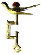 K1704 19th century American Sewing Bird Clamp with velvet covered pincushion intact. Part of the Patent date is legible on birds left wing
15 1853. There is also stamping around the edge of the birds right wing, however it is illegible. All mechanics are in good working condition and the beak clamps tightly. Composition appears to be gold gilded solid brass as a magnet does not stick. This is a great example of the first sewing bird patent that was granted to Charles Waterman of Meriden, Connecticut on February 15, 1853 and was by far the most popular style often called the Waterman Bird after its creator. Approximate measurements: 3 ½ long (beak to tip of tail) x 2 wide x 5 tall.