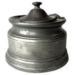 **SOLD** K188 18th century Pewter inkwell fitted with four quill holes and hinged lid covering its original removeable porcelain ink pot. Circa 1780s – 1800. Measurements: 4 1/8” diameter x 3 ½” tall to top of finial on lid.