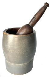 J234 19th century original gray painted Mortar and Pestle. Each part is turned from one solid piece of wood. Both the pestle, and the interior of the mortar, retain wonderful natural patina. Very sturdy with good weight. No cracks. The Mortar measures 8 tall x 6 diameter bottom with a 2 1/4 wide band around the bottom before the sides curve around the bowl and taper back in to a 6 ¼ diameter top. Pestle appears to be original to the mortar and measures 12 long with wear indicative of years of use.