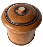 K195B Pennsylvania turned wooden treenware spice container / trinket box featuring a threaded, slightly domed lid adorned with inlaid mother of pearl at the top button and a narrow rim foot. This style of container is attributed to the Lancaster-Lebanon County region of Pennsylvania. The wood appears to be maple with a smooth lacquered finish. Measurements: 3 diameter across lid x 3 tall