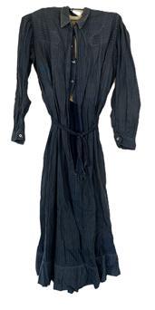 (i316) Late 19th century Womans Indigo Blue cotton dress with lined bodice and pearl buttons. This simple working dress shows extensive make-do repairs that were done with various indigo blue calico print fabrics a true sign that this dress was used regularly, and for a long period of time. Circa 1860s-1880s.
