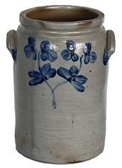 **SOLD** K1550 A very impressive Peter Hermann Baltimore, MD large crock with applied handles stamped 3 - decorated with a characteristic stemmed clover motif design that is associated with wares made in Baltimore, MD. A sweeping pattern of brushed flowers enhances this rare, oversized vessel. Peter Hermann was one of Marylands premier 19th century potters. Circa 1855 1870. Chips to rim. Measurements: Top opening is out of round and measures 9 x 8. Overall height is 13 ½ tall.