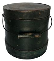 B373 Small original green painted Firkin late 19th century , tack and staple construction with wire bale handle, painted green-wonderful patina. Dimensions: 6.5" high, 6.5-inch base diameter
