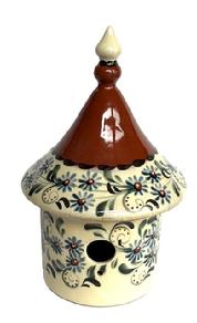 M138 Beautiful Signed and dated 2009 Eldreth Pottery painted and slip-decorated Redware Birdhouse. Two pieces so that lid can be removed for easy cleaning. Bottom is impressed with DAVID ELDRETH NOTTINGHAM PA and Eldreth 2009 KMc is carved into the redware clay. Measurements: middle diameter (base of lid) is ~7, base diameter is 5 and overall height is ~11 tall.