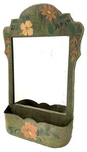 M305 Late 19th century mirror with molded metal-wrapped decoratively shaped frame with very early silvered back looking glass and scalloped edged tin comb box below. Original hand painted surface retains tole painted floral motifs. Measurements: 19 ½ wide x 29 ¾ tall x 5 ½ deep. Mirrored area measures 14 wide x 17 ½ tall.