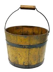 **SOLD** M179 Mid-19th century Shaker wooden bucket stamped JK on bottom. Bucket features iron diamond-shaped bail plates, wire bail with turned wood handle, chamfered bottom and tongue and grooved softwood staved sides secured with two iron bands bearing nice old yellow paint over original blue paint with great wear and patina on outside and natural patina interior. Measurements: 11 ¼ x 11 ¾ top diameter. 9 ½ x 10 bottom diameter. 9 tall not including handle.