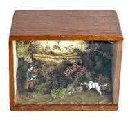 L451 Folk Art Hunting Diorama with Lead Figures constructed inside a vintage Armando Ramos Cigar box. Handmade with great use of natural elements to depict a realistic bird hunting scene. Measurements: 6 &frac14;� wide x 3 7/8� deep x 4 &frac34;� tall.  