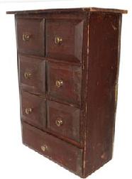 C513 Seven Drawer Spice Cabinet circa 1880 six small drawers over one large drawer in simple nail construction with old red surface