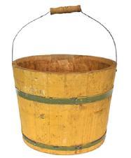 L189 Late 19th century original yellow painted bucket from Pennsylvania with arched wire bail handle and turned wooden grip. The interior is old natural patina. Tongue and grooved staved construction held in place with metal bands. Measurements: 12 ¼ 12 ½ top diameter x 10 ¼ bottom diameter x 9 ½ tall (not including handle).