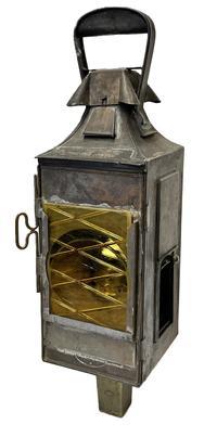 K74 Rare Two-way Railroad signal lantern marked �L. Dorvaux Paris 1901� with removeable thick, yellow-colored textured glass panels. Multiple manufacturers are also identified in different areas of this lantern as the kerosene insert is marked �EUG. HALARD Paris� on the front and �POYARD� on the wick raiser knob. Tin and brass. Evidence of early metal repairs � however they do not affect the integrity of the lantern.  Very sturdy, heavy lantern in good condition. Measurements: 5 &frac14;� square x 19 &frac12;� tall.