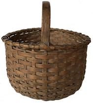 D509 Gathering Basket round in old natural patina with a single wrapped rim and steamed a bent handle, with a slight kicked in bottom with a wrapped ring around bottom Measurement 14" wide x 13" tall