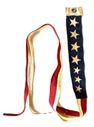 RM1639 Seven Star Ships Commissioning Pennant flown on the masthead or on the bows of captains gigs - of a commissioned U.S. Navy Ship Pennant. Constructed of wool bunting with a single metal grommet and features seven graduated white fabric stars on each side, appliqued to a blue background that is adjoined to single red and white longitudinal stripes with swallow tail ends (1917-1945). Historically, these long, narrow pennants were hoisted on the day a ship was commissioned to mark its official entry into active Navy service becoming a United States Ship (USS) and used as a visual signal to distinguish warships from merchant vessels. Pennant tapers from 2 3/8 wide to tips of the tails that are ¼ wide. Overall length is 48 long.