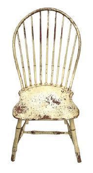 L121 19th century Pennsylvania Bow Back Windsor chair with nine spindle back and bamboo turnings in old white over original red painted surface. Great wear from years of use. Measurements: 16 ¾ wide across front of seat x 16 ½ deep seat x 37 ½ tall back. The seat is 16 ½ tall.
