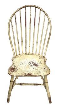L121 19th century Pennsylvania Bow Back Windsor chair with nine spindle back and bamboo turnings in old white over original red painted surface. Great wear from years of use.  Measurements: 16 ¾ wide across front of seat x 16 ½ deep seat x 37 ½ tall back. The seat is 16 ½ tall.  