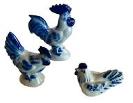 M113 Group of three small Eldreth Pottery Chickens with cobalt blue accents The middle-sized one is signed and dated 97 on bottom, whereas the other two are signed and dated 1999 on bottoms. Graduated heights as follows: 4 3/8 tall, 3 5/8 tall and 2 ¼ tall.