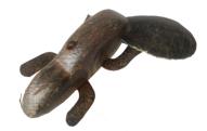 F196 Beaver fishing decoy with movable wooden tail, metal legs, tiny tack eyes, pronounced teeth and retains one side of his wire whiskers. Original weights and paint. From the collection of Barry Nelson. 7 1/4" long