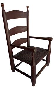 A438 Early Virginia Child’s Ladderback Arm Chair with gracefully turned finials in old red over the original reddish brown paint. Chair is sturdy and has a replaced, tightly woven seat. Circa 1840 – 1850. Measurements: 24 ½” tall x 13 ¼” wide x 12” deep
