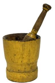M1118 19th century thick-walled wooden mortar and pestle with simple turnings and remnants of incised rings, bearing early mustard yellow painted surface. The pestle, which appears to be original to the mortar, also has remnants of mustard paint. The interior of the mortar and the pestle both bear wear indicative of extensive use. Age crack that does not go completely through on bottom, however it does not affect the integrity of the piece. Measurements: 6 top diameter x 5 ¼ bottom diameter x 6 ¾ tall. The pestle measures ~10 ½ long.