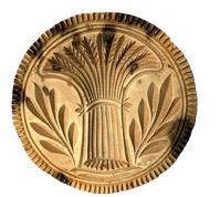L208B 19th century bulbous handled chip-carved butter print stamp of Pennsylvania origin boasting a tied Sheaf of Wheat design with incised rings and patterned outer edge. Carved from a single piece of wood. Very dry, natural patina surface. Measurements: 4 ½ diameter x 3 tall.