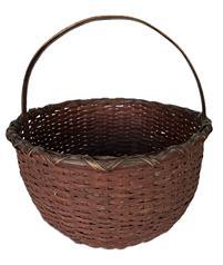 K1622 Exceptionally well-made 19th century tightly hand-woven round gathering basket with single wrapped rim in original red painted surface. Sturdy steamed and bent handle is woven into the sides of the basket. Woven bumped up bottom interior to enhance airflow for gathered items. Great condition! Measurements: 10 ¾ diameter x 4 ¾ tall (sides) x approximately 10 ½ tall including handle.
