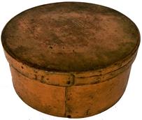 E591 New England 19th Century Pantry Box, with original dry pumpkin paint, with over lapping bentwood sides, secured with small metal tacks. Measurements :8" diameter x 3 3/4' tall