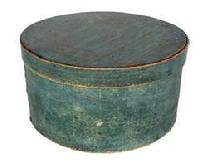 G524 19th century pantry box in original blue paint with remnants of proprietors stamp on top of lid. Steamed and bent wood is held in place with tiny wooden pegs around top and bottom and tacks secure the overlaps. Wonderful natural patina inside. Measurements: 5 tall x 9 3/4 diameter (top) x 9 1/2 diameter (bottom).