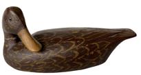 RM1082 Miniature Black Duck Decoy with turned head and nice paint detail. Initials FLG engraved on bottom - which stands for the name of carver: Franklin L Gosnell of Roxanna DE. Measures 5 1/4" long x 2 1/4" tall