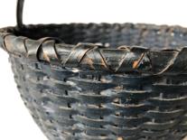 E512 Gathering Basket , the original dark indigo blue paint, with a double wrapped rim, steamed and bent handle, and a slight raised bottom. Measurements are:10 1/2" diameter x 9 1/2' tall