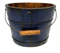 M1145 19th century original blue painted bucket from Pennsylvania with arched wire bail handle and turned wooden grip. The interior is old natural patina. Tongue and grooved staved construction held in place with thick wire bands. Measurements: 9 ¾ x 10 1/8 top diameter x 7 ¾ bottom diameter x 7 ½ tall (not including handle).