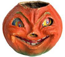 M68 Paper Mache Pulp Pumpkin Smiling Jack O Lantern. Circa 1930-1940s. The lantern retains great original orange and green surface with what appears to be its original wire handle and paper insert for eyes and mouth. Nice condition! Pumpkin measures ~ 7 at widest point x ~6 deepest point x and is 5 ¼ tall not including handle.