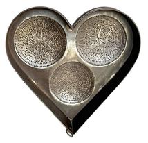 **SOLD** M185 Exceptional 19th century Pennsylvania heart shaped tin cheese strainer / mold with three separate pierced / punched pinwheel decorations, attached feet and attached loop for hanging purposes. Nicely rolled edges and all solder joints are secure. Fantastic condition. Measurements: ~14 ¼ long x ~ 14 5/8 wide. Strainer stands ~3 tall, including the feet.