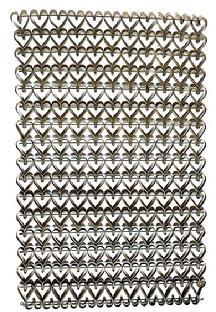 M49 19th century Folk Art Iron heart motif doormat constructed of individually handmade and bent heart shapes hooked together in a way that allows them to mold perfectly into the one next to it. These highly desirable heart mats were sometimes referred to as �mud mats� or �sweetheart mats� since the heavy metal would scrape mud from shoes/boots, and one was considered a �sweetheart� for the courtesy of doing so when entering a person�s home. Circa 1880s-1920s. Measurements: 23 &frac14;� x 15 &frac14;� x &frac14;� thick. 