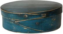F35 mid-19th century Bentwood construction having tacked lap joints. Oval pantry Box in the original dry blue paint with finger laps. Measurements are: 5 3/8" x 2" tall