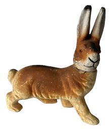 J50B Early 20th century German Rabbit Candy Container - made of a paper mâché / composite material (not flocked) and painted to mimic a tri-colored rabbit (brown/white/black) in a walking pose. Removable head with glass eyes. Good condition with very minor losses. Circa 1920-1930s.