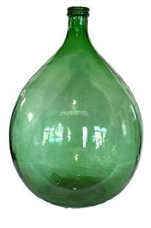 L172 Large molded green glass Demijohn bottle featuring double ring lip with tapered neck over bulbous body, mold lines at sides, shaped and slightly depressed base. Bubbles throughout. Approximate measurements: 25" tall x 3 top diameter.