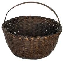 L91 Eastern Shore, Maryland Basket featuring its natural surface with a double wrapped rim and a steamed and bent handle that is woven into the basket.  Nice, tight weave, with an interior bumped up bottom to help with weight distribution. Measurements: The opening is 10 x 10 ¼ across top opening. Sides are 4 ½ tall. Overall height at handle is approximately 8 ½ tall. 