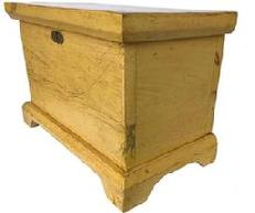 E484 19th centuury York County Pennslyvania diminutive Blanket Chest , in the original yellow paint. Simple applied bracket base as well as a molded lid. Circa 1860