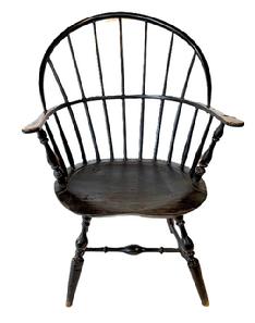 L514 19th Century black painted continuous arm Windsor Chair. Sturdy seven spindle back, curved arms, shaped seat and bamboo style turnings mortised through the seat with H stretcher base. Circa 1810 1820s. Measurements: 24 wide (across arms) x 14 deep (seat) x 34 ¼ tall (back). The seat is 15 from floor.
