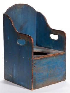 E23119th century NEW ENGLAND PAINTED CHILD'S POTTY CHAIR,in the original dry blue paint with cut-outs on the sides. Measurements are . 24 1/2" High , 14" Wide, 13 3/4" Deep